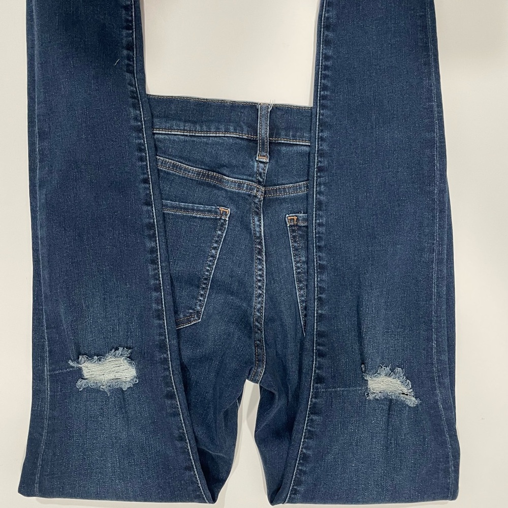 Express Mid Rise Distressed Skinny Jeans - Picture 9 of 13